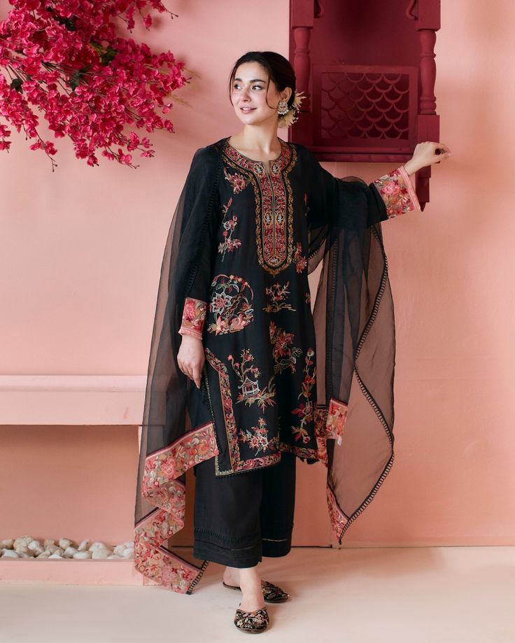 Traditional Pakistani formal suit with heavy embroidery